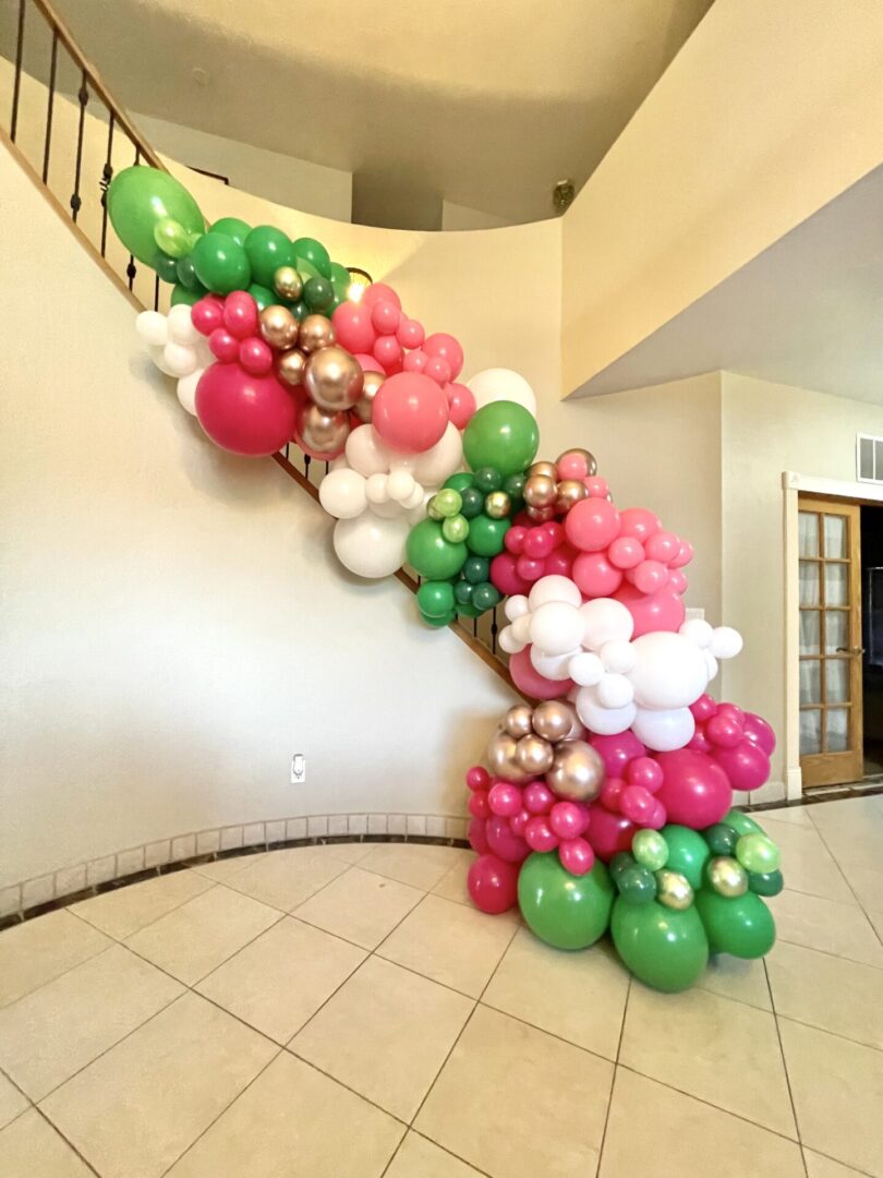 Balloon Bouquets balloon decoration at stairs for party