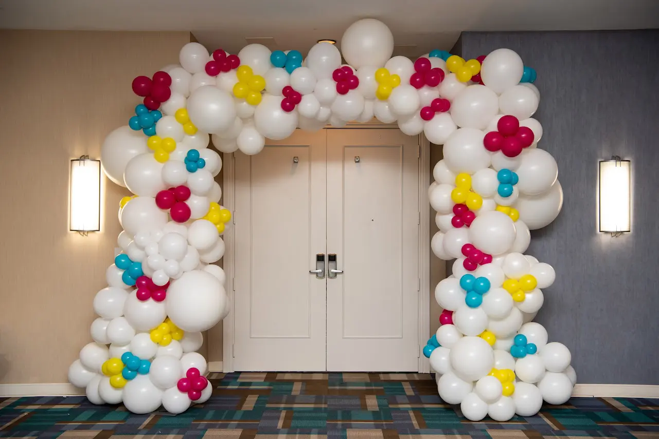 A balloon gate outside a room gate in a house