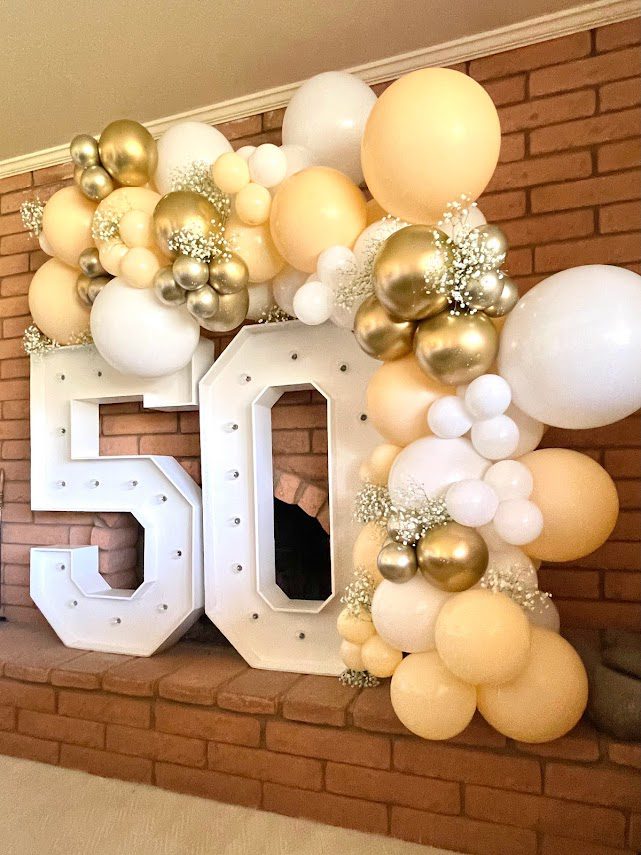 A 50 years design made of different color balloons