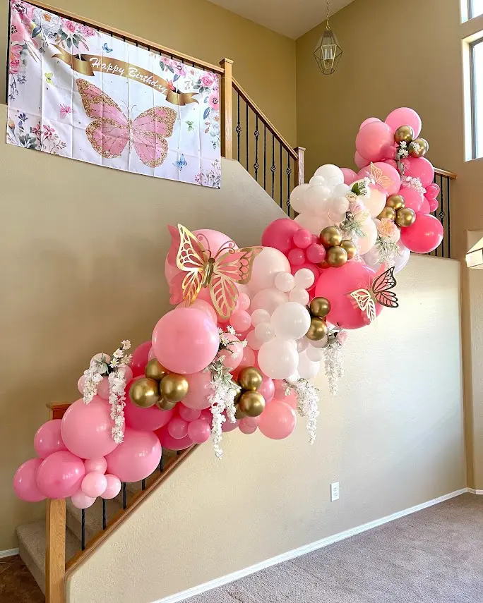A pink and white color balloon design